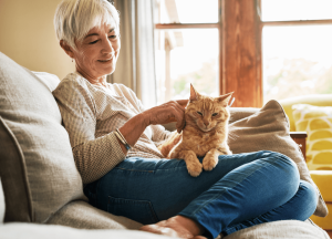 Woman on couch with cat